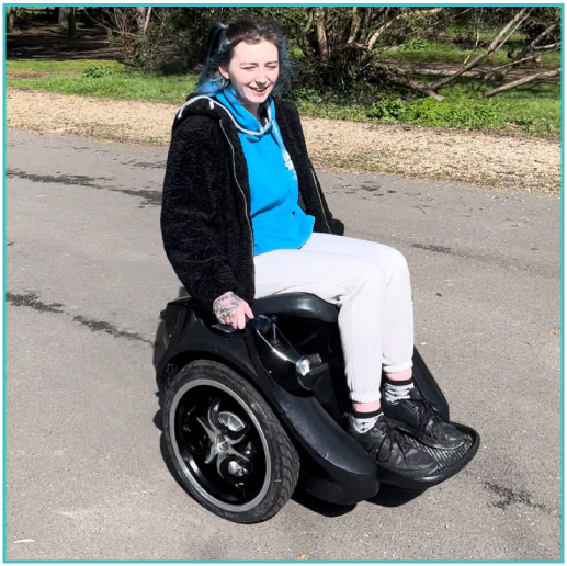 Girl on omeo black electric modern wheelchair